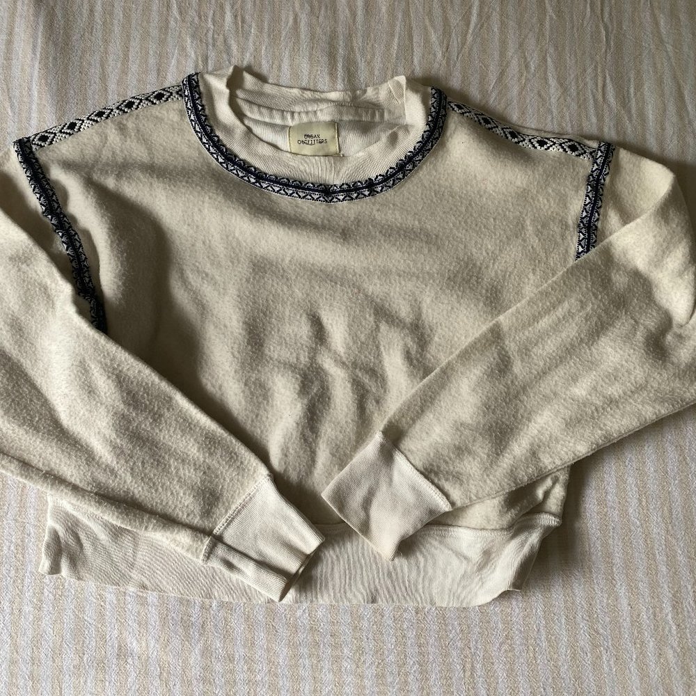 Urban Outfitter, cream fuzzy crewneck with blue patterned lining.